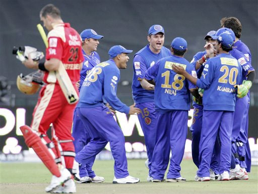 Rajasthan Royals team members react after catching the ball off the bat of Kevin Pietersen, foreground left, during the Indian Premier League Twenty20 match in Cape Town. (AP Photo) Match 2: JAI vs BLR
