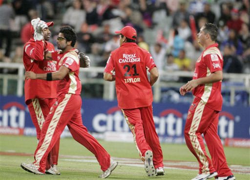 Bangalore Royal Challengers team members react after taking the wicket of Swapnil Asnodkar during the Indian Premier League Twenty20 match in Cape Town. (AP Photo) Match 2: JAI vs BLR