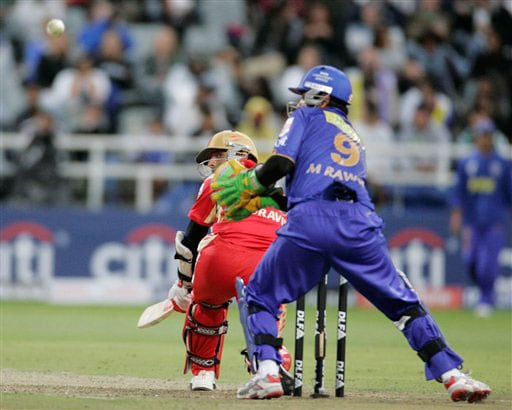Rahul Dravid hits the ball during a game against the Rajasthan Royals at the Indian Premier League Twenty20 match in Cape Town. (AP Photo) Match 2: JAI vs BLR