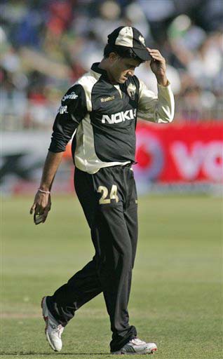 Kolkata Knight Riders' Sourav Ganguly reacts after finishing his bowling over against Royal Challengers Bangalore's during their IPL match in Durban on Wednesday. (AP Photo) Match 19: BLR vs KOL