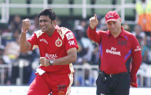 Royal Challengers Bangalore's Anil Kumble celebrates after taking a wicket of Kolkata Knight Riders' Brad Hodge during their IPL match in Durban on Wednesday. (AP Photo) Match 19: BLR vs KOL