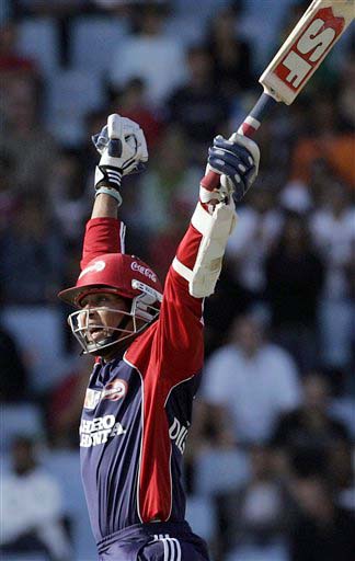 Delhi Daredevils batsman Tillakaratne Dilshan watches his shot as he scores six during the IPL match against Deccan Chargers at the Super Sport Park on Thursday. Delhi Daredevils won by 6 wickets with 8 balls remaining. (AP Photo) Match 21: DEL vs HYD