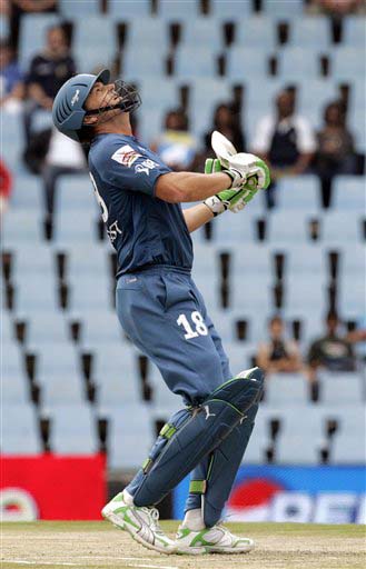 Deccan Chargers batsman Adam Gilchrist looks up as his shot is mid-air during the IPL match against Delhi Daredevils at the Super Sport Park on Thursday. (AP Photo) Match 21: DEL vs HYD