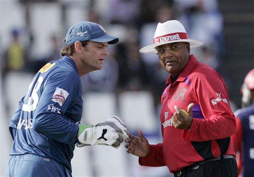 Umpire Amiesh Saheba of India has a word with Deccan Chargers captain Adam Gilchrist after teammate bowler Fidel Edwards protested against wide call during the IPL match at the Super Sport Park on Thursday. (AP Photo) Match 21: DEL vs HYD