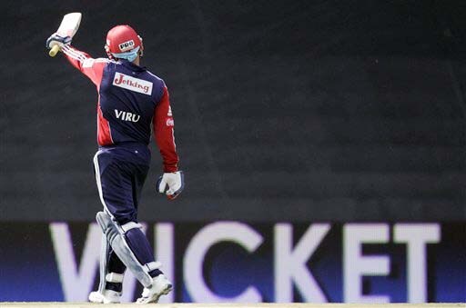 Delhi Daredevils captain Virender Sehwag leaves the crease after his dismissal by Deccan Chargers' RP Singh for 20 runs during the IPL match at the Super Sport Park on Thursday. (AP Photo) Match 21: DEL vs HYD