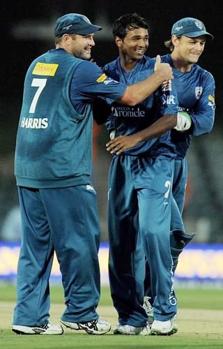 Deccan Chargers' Tirumalsetti Suman celebrates with teammates after taking the wicket of unseen Chennai Super Kings' Murali Vijay during the IPL match against Deccan Chargers at the Buffalo Park on Monday. (AFP Photo) Match 29: CSK vs HYD