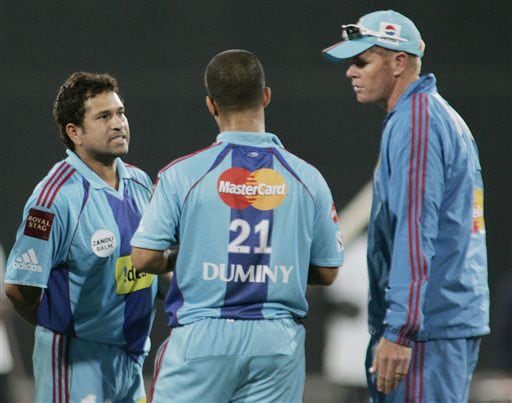 Sachin Tendulkar, Shaun Pollock and JP Duminy share a moment during IPL match against in Pretoria. (AP Photo) Match 32: MUM vs HYD