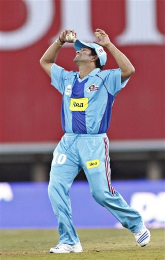 Sachin Tendulkar reacts after he misses a throw while fielding against during their IPL match in Pretoria. (AP Photo) Match 32: MUM vs HYD