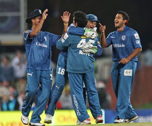 Rohit Sharma and Adam Gilchrist along with other team mates celebrate the dismissal of JP Duminy during their IPL match in Pretoria. (AP Photo) Match 32: MUM vs HYD