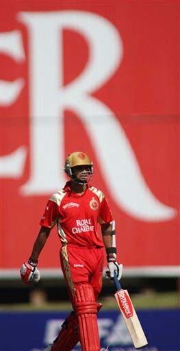 Royal Challengers Bangalore's Rahul Dravid walks back towards the dressing room after Rajasthan Royals' Lee Carseldine took his wicket during their IPL match in Centurion on Thursday. (AP Photo) Match 33: JAI vs RCB