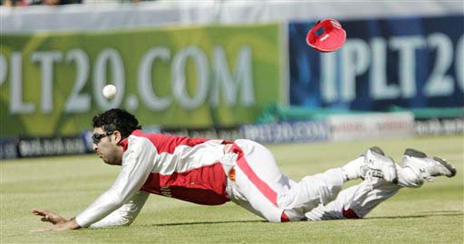 Kings XI Punjab's Yuvraj Singh attempts to catch the ball while fielding against Deccan Chargers during their IPL match in Kimberley on Saturday. (AP Photo) Match 36: HYD vs MOH