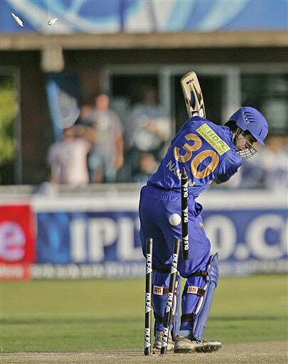 Bails fly for the dismissal of Naman Ojha, batting against Chennai Super Kings during their IPL match in Kimberley. (AP Photo) Match 37: CSK vs JAI