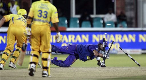Naman Ojha raise the wickets and the bails for a successful dismissal of Matthew Hayden during their IPL match in Kimberley. (AP Photo) Match 37: CSK vs JAI