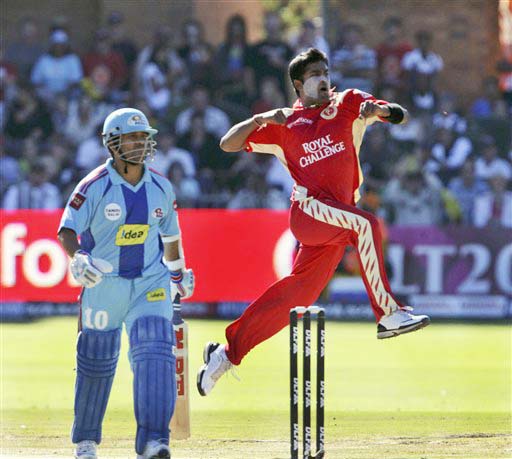Royal Challengers Bangalore's Vinay Kumar reacts after taking the wicket of Mumbai Indians captain Sachin Tendulkar in the IPL match in Port Elizabeth on Sunday. (AP Photo) Match 38: MUM vs RCB