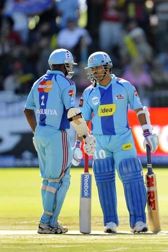 Mumbai Indians' Sanath Jayasuriya and Sachin Tendulkar talk during a change of bowling in their IPL match against Royal Challengers Bangalore in Port Elizabeth on Sunday. (AFP Photo) Match 38: MUM vs RCB