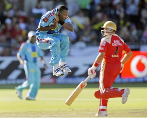 Mumbai Indians' Dwayne Bravo jumps to avoid the ball during the IPL match against Royal Challengers Bangalore in Port Elizabeth on Sunday. (AFP Photo) Match 38: MUM vs RCB