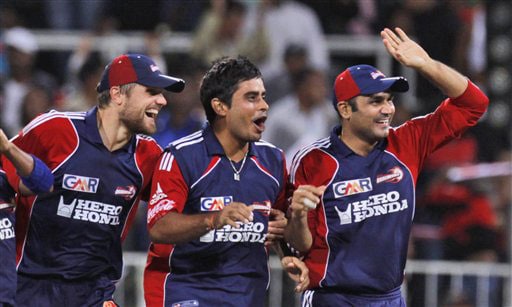 Rajat Bhatia, Virender Sehwag and Dirk Nannes celebrate their team's victory over Deccan Chargers in the IPL match in Durban. (AP Photo) Match 43: DEL vs HYD