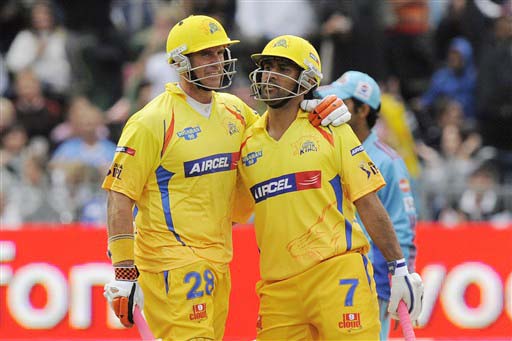 Chennai Super Kings' Matthew Hayden and Mahendra Singh Dhoni embrace as they celebrate winning their IPL match against Mumbai Indians at St. George's Park, Port Elizabeth on Saturday. Chennai Super Kings won by 7 wickets. (AFP Photo) Match 47: MUM vs CSK