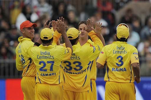 Chennai Super Kings cricketers congratulate Albie Morkel after his dismissal of Mumbai Indians' Dwayne Bravo during their IPL match at St. George's Park, Port Elizabeth on Saturday. (AFP Photo) Match 47: MUM vs CSK