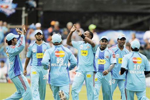 Mumbai Indians cricketers celebrate the dismissal of Chennai Super Kings' Parthiv Patel during their IPL match at St. George's Park, Port Elizabeth on Saturday. (AFP Photo) Match 47: MUM vs CSK