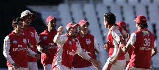 Kings XI Punjab captain Yuvraj Singh reacts with teammates as they win their IPL match against the Deccan Chargers at the Wanderers stadium in Johannesburg on Sunday. Punjab won by 1 run. (AP Photo) Match 49: HYD vs MOH
