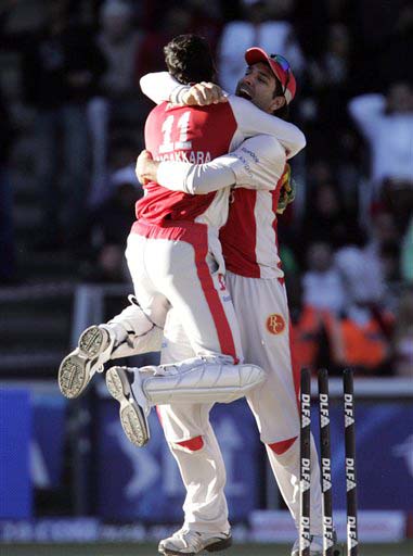 Kings XI Punjab skipper Yuvraj Singh celebrates with teammate Kumar Sangakkara as they win their IPL match against Deccan Chargers at the Wanderers stadium in Johannesburg on Sunday. (AP Photo) Match 49: HYD vs MOH