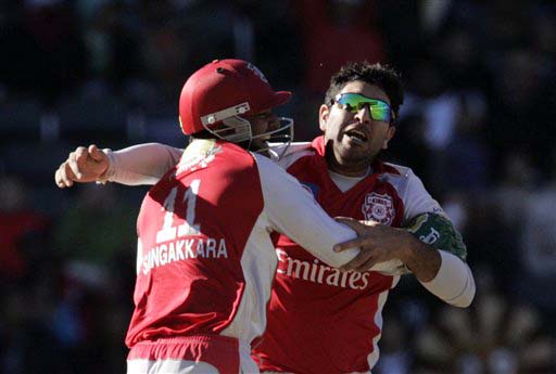 Kings XI Punjab captain Yuvraj Singh celebrates his hat-trick with wicketkeeper Kumar Sangakkara during the IPL match at the Wanderers stadium in Johannesburg on Sunday. (AP Photo) Match 49: HYD vs MOH