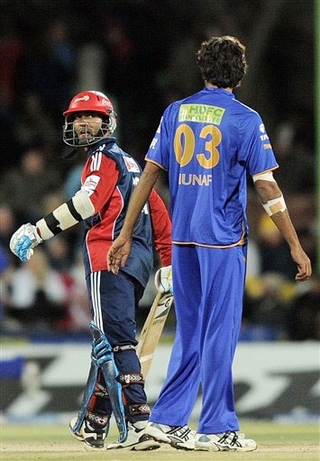 Dinesh Karthik exchanges words with Munaf Patel during their IPL match in Bloemfontein. (AFP Photo) Match 50: DEL vs JAI