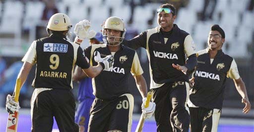 Kolkata Knight Riders' Laxmi Ratan Shukla along with his teammates, celebrates after beating Rajasthan Royals during their IPL match in Durban on Wednesday. (AP Photo) Match 53: JAI vs KKR