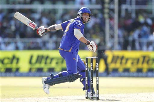 Rajasthan Royals' Shane Warne misses a shot while batting against Kolkata Knight Riders during their IPL match in Durban on Wednesday. (AP Photo) Match 53: JAI vs KKR