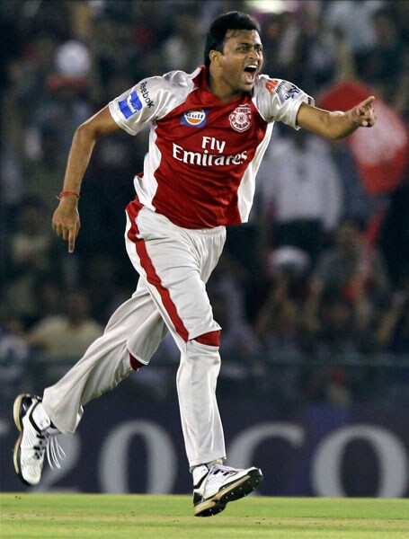 Kings XI Punjab's bowler Shalabh Srivastava celebrates the wicket of Kolkata Knight Riders' batsman Mandeep Singh during their IPL 3 match in Mohali. (PTI Photo) IPL 3: Kolkata vs Punjab