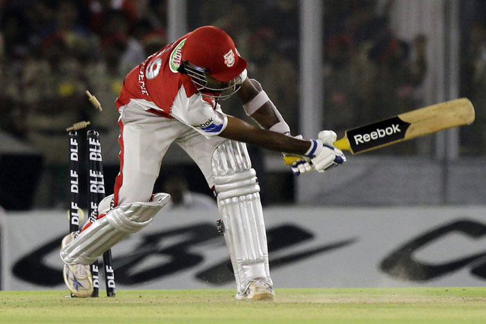 Kings XI Punjab Mahela Jayawardene gets clean bowled during their IPL T20 match against Kolkata Knight Riders in Mohali. (PTI Photo) IPL 3: Kolkata vs Punjab