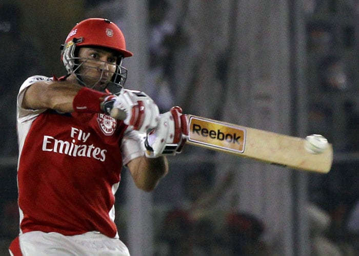 Kings XI Punjab's Yuvraj Singh plays a shot against Kolkata Knight Riders during their IPL 3 match in Mohali. (PTI Photo) IPL 3: Kolkata vs Punjab