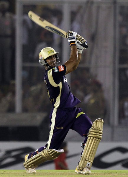 Kolkata Knight Riders' Manoj Tiwary plays a shot against Kings XI Punjab during their IPL 3 match in Mohali. (PTI Photo) IPL 3: Kolkata vs Punjab