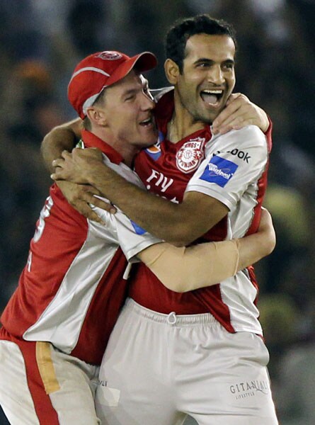 Kings XI Punjab bowler Irfan Pathan and his teammate Brett Lee celebrate Kolkata Knight Riders skipper Sourav Ganguly's wicket during an IPL match in Mohali. (PTI Photo) IPL 3: Kolkata vs Punjab