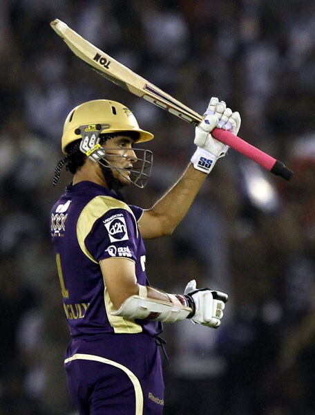 Kolkata Knight Riders captain Sourav Ganguly raises his bat as he completes his 50 during an IPL 3 match against Kings XI Punjab in Mohali. (PTI Photo) IPL 3: Kolkata vs Punjab