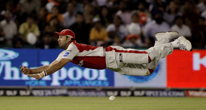 Kings XI Punjab's Yuvraj Singh dives for an unsuccessful catch for the dismissal of Royal Challengers Bangalore's Jacques Kallis during the Indian Premier League 3 match in Mohali. (PTI Photo) IPL 3: Punjab vs Bangalore