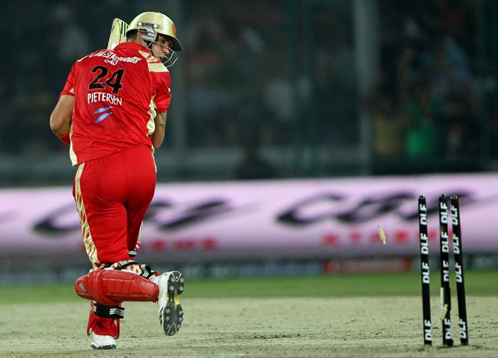 Royal Challengers Bangalore batsman Kevin Pietersen being bowled by Delhi Daredevils' Pradeep Sangwan during the IPL match at Feroz Shah Kotla Stadium in New Delhi. (PTI Photo) IPL 3: Delhi vs Bangalore