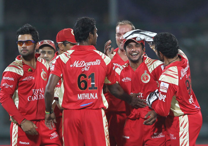 Royal Challengers celebrate wicket of Delhi Daredevils' Gautam Gambhir during the IPL match at Feroz Shah Kotla Stadium in New Delhi. (PTI Photo) IPL 3: Delhi vs Bangalore
