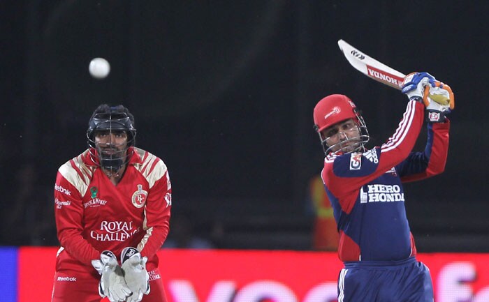 Delhi Daredevils' Virender Sehwag plays a shot during the IPL match against Royal Challengers Bangalore at the Feroz Shah Kotla Stadium in New Delhi. (PTI Photo) IPL 3: Delhi vs Bangalore