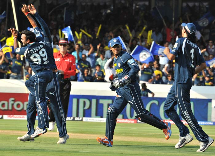 Amit Mishra celebrates the wicket of Sachin Tendulkar during the IPL Twenty20 match between Deccan Chargers and Mumbai Indians at the Rajiv Gandhi International Stadium in Hyderabad. (AFP Photo) IPL 4: Mumbai vs Deccan