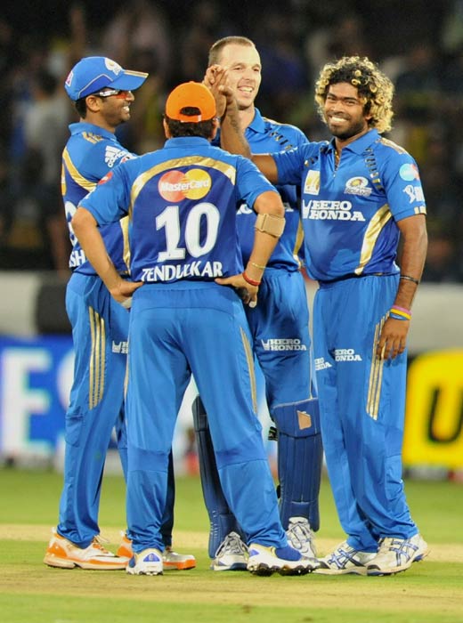 Lasith Malinga celebrates the wicket of Dwaraka Ravi Teja during the IPL Twenty20 match between Deccan Chargers and Mumbai Indians at the Rajiv Gandhi International Stadium in Hyderabad. (AFP Photo) IPL 4: Mumbai vs Deccan