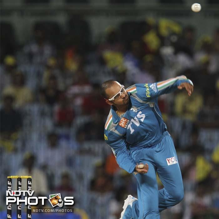 Pune Warriors bowler Murali Kartik bowls during the IPL Twenty20 cricket match against Chennai Super Kings at the M.A. Chidambaram Stadium in Chennai. (AFP Photo) IPL 5: Chennai beat Pune by 13 runs