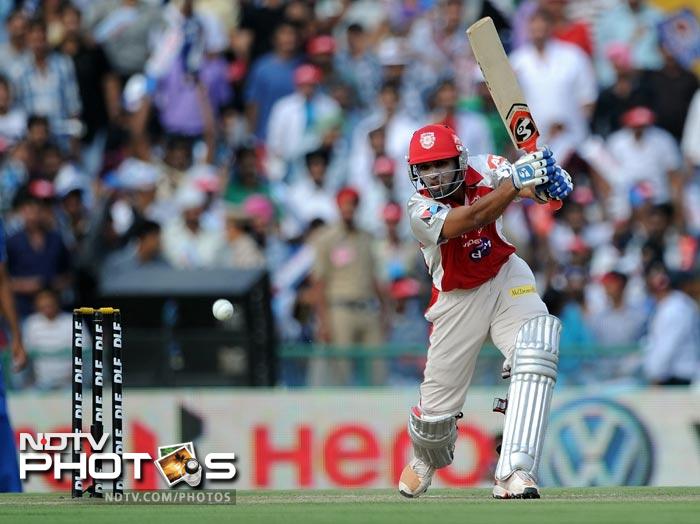 Nitin Saini plays a shot during the IPL Twenty20 match between Kings XI Punjab and Mumbai Indians at PCA Stadium in Mohali. (AFP Photo) IPL 5: Mumbai beat Punjab by 4 wickets