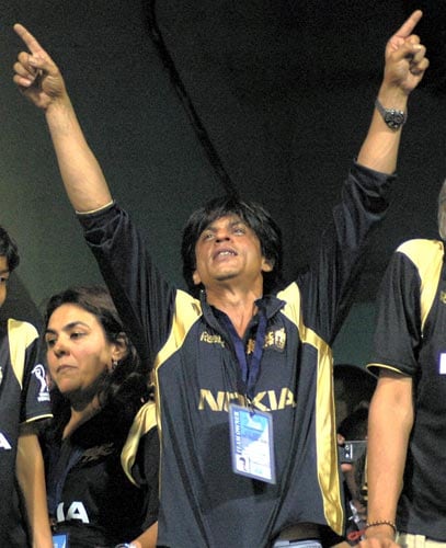 Kolkata Knight Riders' owner Shahrukh Khan celebrates his team win over Bangalore Royal Challengers during the inaugural IPL T20 Championship match at Chinnaswamy stadium in Bangalore on Friday. (PTI Photo) 1st Match: Knight Riders vs Royal Challengers
