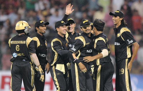 Kolkata Knight Riders' Captain Sourav Ganguly celebrates with his teammates after the wicket of Bangalore Royal Challengers player Mark Boucher during the inaugural IPL T20 Championship match at Chinnaswamy stadium in Bangalore on Friday. (PTI Photo) 1st Match: Knight Riders vs Royal Challengers