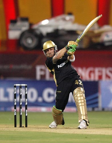 Kolkata Knight Riders' Brendon McCullam hits a six against Bangalore Royal Challengers during the inaugural IPL T20 Championship match at Chinnaswamy stadium in Bangalore on Friday. (PTI Photo) 1st Match: Knight Riders vs Royal Challengers
