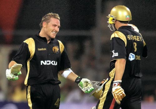 Kolkata Knight Riders' Brendon McCullam celebrates with teammate David Hussey after his century against Bangalore Royal Challengers during the inaugural IPL T20 Championship match at Chinnaswamy stadium in Bangalore on Friday. (PTI Photo) 1st Match: Knight Riders vs Royal Challengers