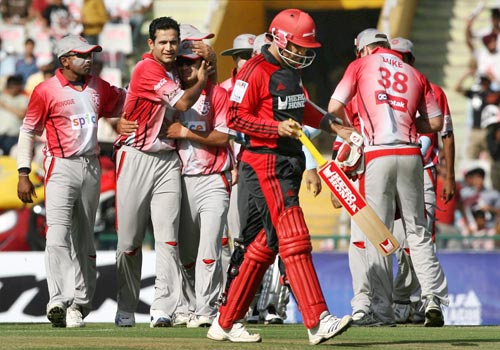 Kings XI Punjab player Irfan Pathan celebrates with his teammates after dismissing Delhi Daredevil player Virender Sehwag at IPL Championship at Mohali on Sunday. (PTI Photo) 13th Match: Kings XI Punjab vs Delhi Daredevils