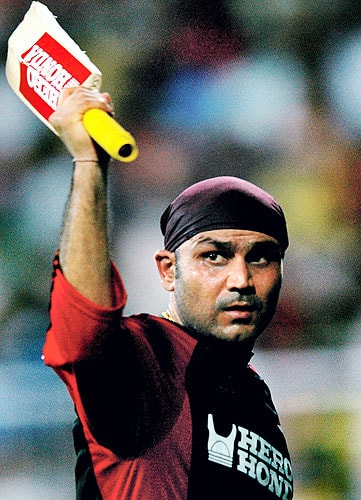 Delhi Daredevils' skipper Virender Sehwag acknowledges the crowd during the IPL T20 championship match against the Chennai Super Kings at MAC Stadium in Chennai on Friday. (PTI Photo) 20th Match: Daredevils vs Super Kings